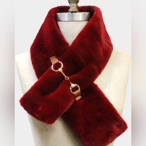 Horsebit detailing on Super Luxurious burgundy Faux Fur crossover scarf